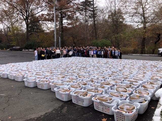 Key Club along with some of the 600 baskets assembled 