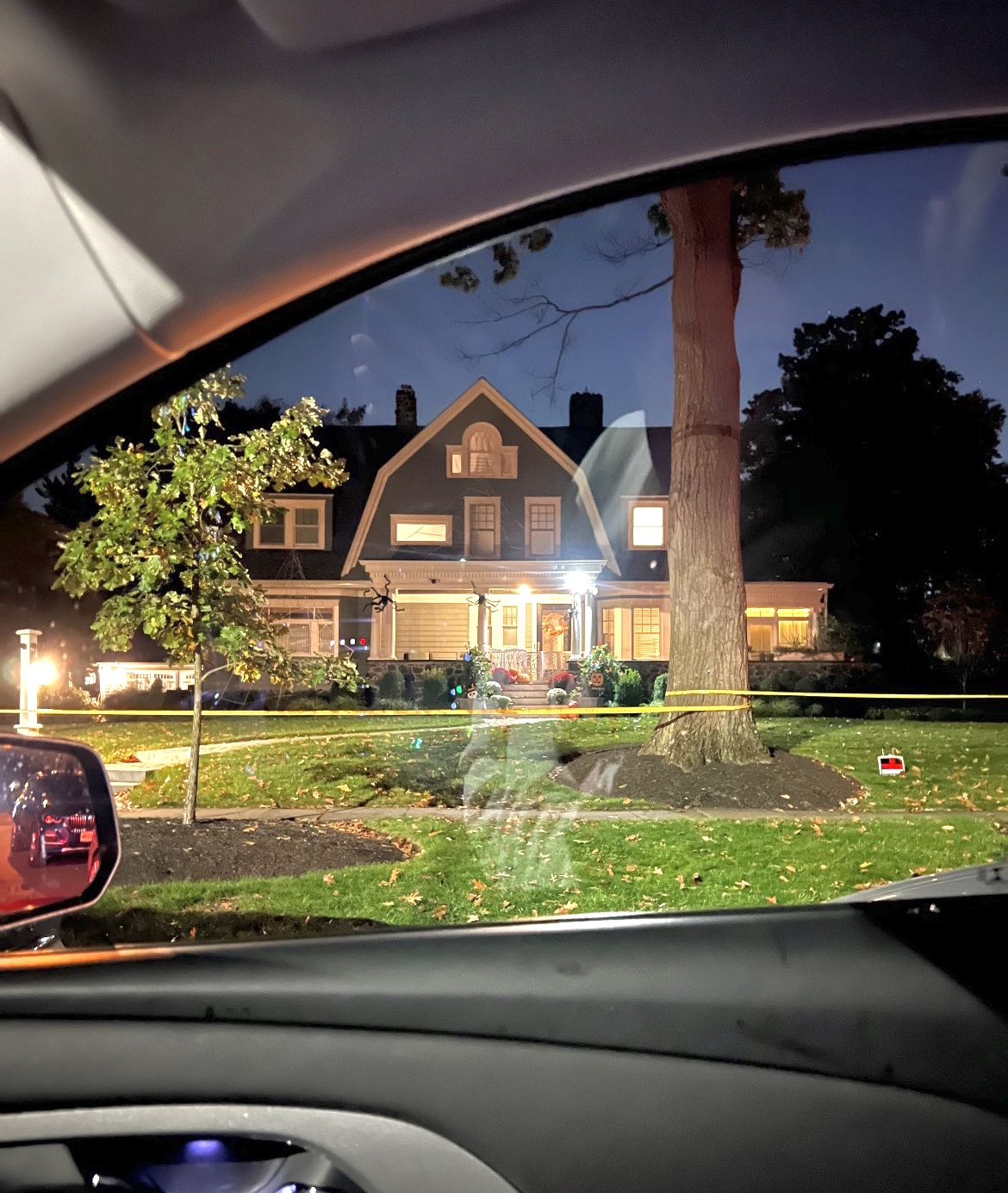 The real "The Watcher" house on 657 Boulevard in Westfield, New Jersey with caution tape surrounding the home