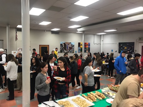 Teachers and students gather to support and enjoy the Night of Nations event.