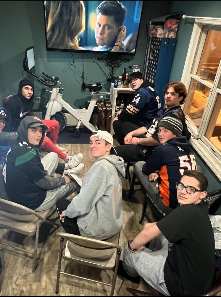A group of friends gather to watch Super Bowl LVI