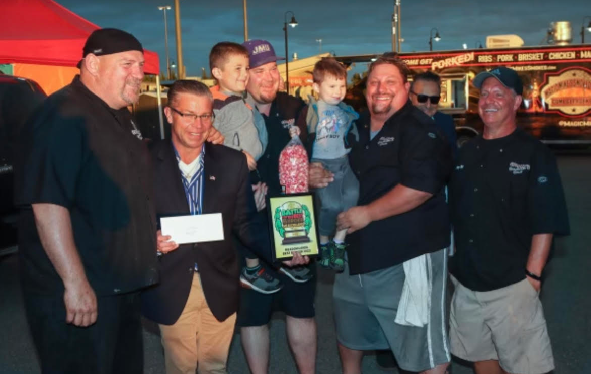 Spanky and friends accepting "Best Burger" award