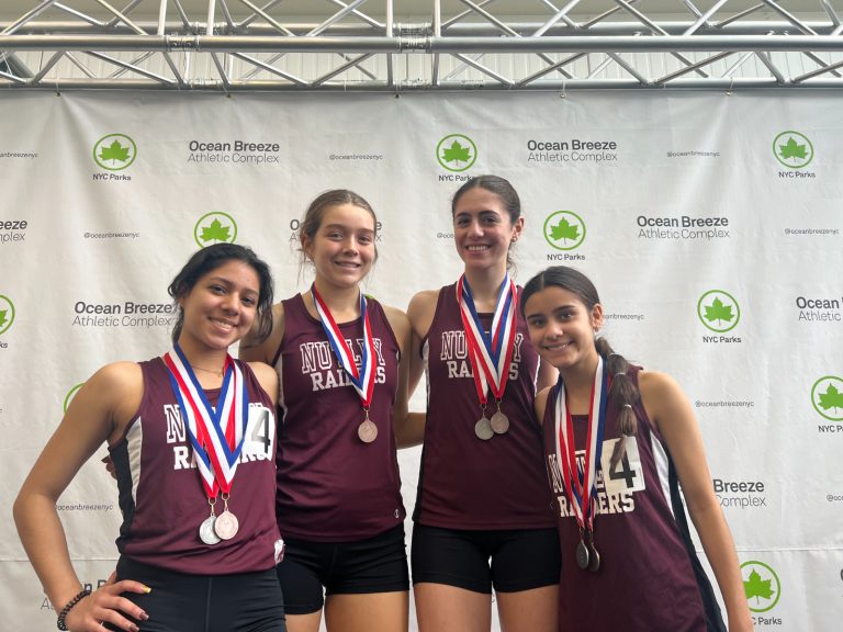 The 4x800 meter relay team of (right to left) Jaylin Romero, Emma Kirby, Marcella Blancato, and Meya Ranges. 