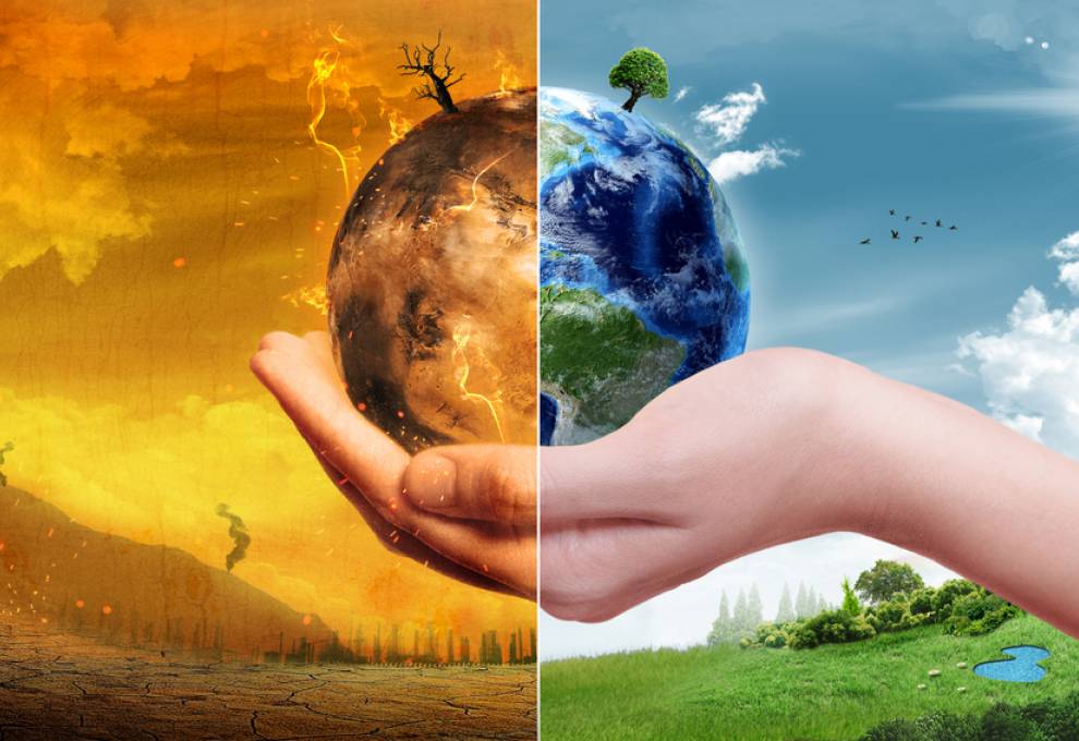 A hand holding earth, one side is dry and covered in fire, while the other is pristine 