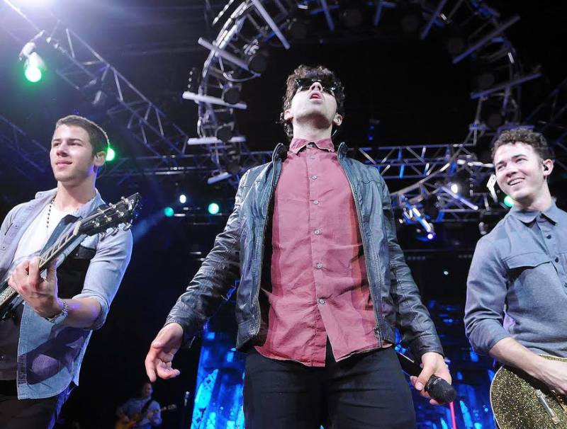 This is a picture of the Jonas Brothers on stage!