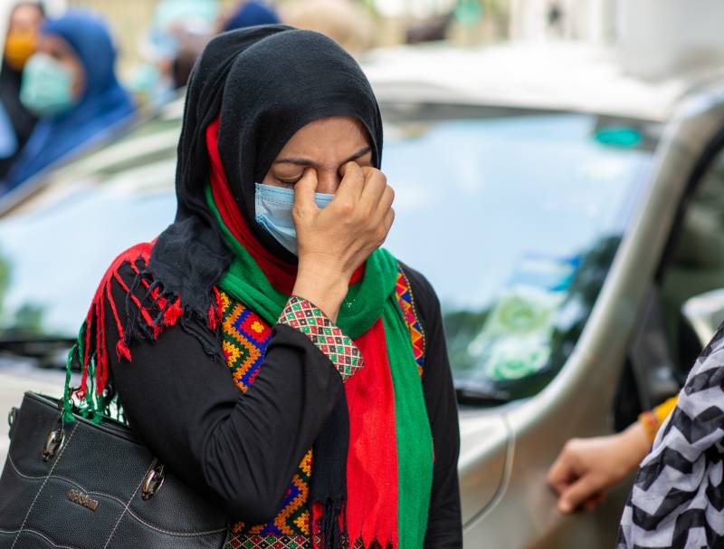 this is a afghan woman in stress because of everything going on. 