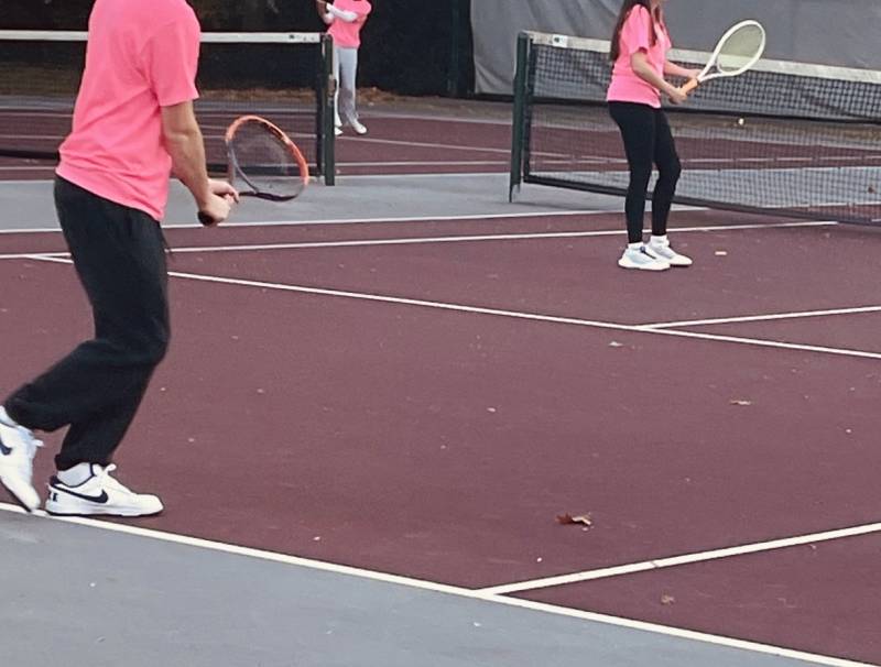 Juniors Alexis Rodriguez  and Noah Balsiak  acing the courts during the Servathon. 