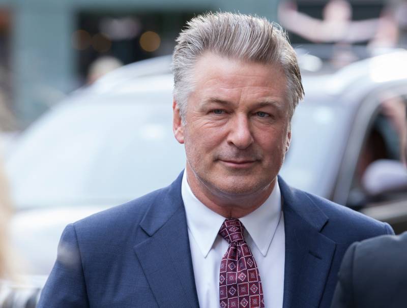 picture of Alec Baldwin outside, near his car 