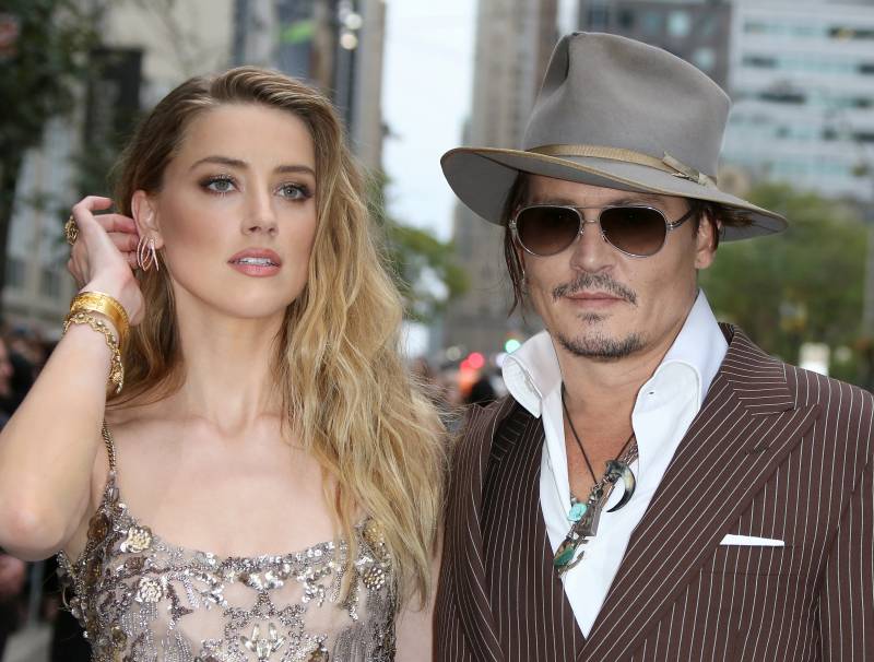 Johnny Depp and Amber Heard on the red carpet in Toronto, Canada.