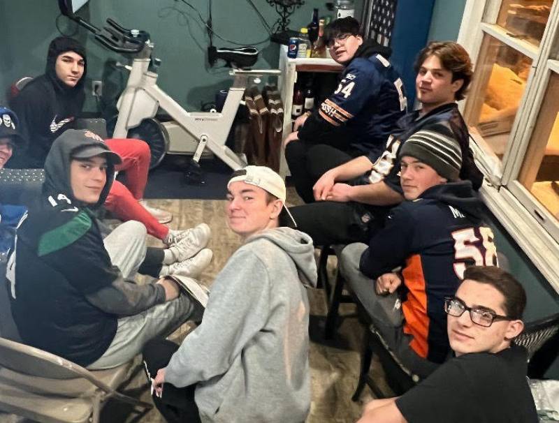 A group of friends gather to watch Super Bowl LVI
